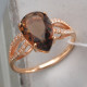 Подкупающее кольцо с фианитами и кристаллом из серебра 925 пробы с золочением