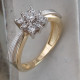 Рафинированное кольцо с фианитами из комбинированного золота 585 пробы