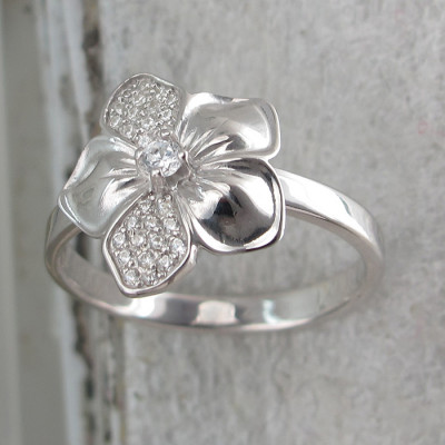 Умопомрачительное кольцо с фианитами из серебра 925 пробы фото