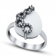Кольцо с цирконом и ониксом из серебра 925 пробы цвет металла белый 3.53 гр. фото
