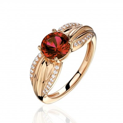 Кольцо с гранатом и  фианитом из красного золота 585 пробы фото