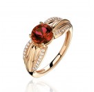 Кольцо с гранатом и  фианитом из красного золота 585 пробы