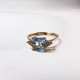 Кольцо с топазом и  фианитом из красного золота 585 пробы