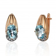 Серьги с топазом и  фианитом из красного золота 585 пробы фото