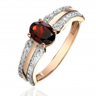 Кольцо с гранатом и  фианитом из красного золота 585 пробы фото