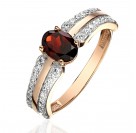 Кольцо с гранатом и  фианитом из красного золота 585 пробы