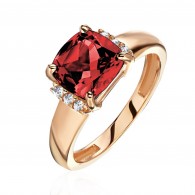 Кольцо с гранатом и  фианитом из красного золота 585 пробы фото