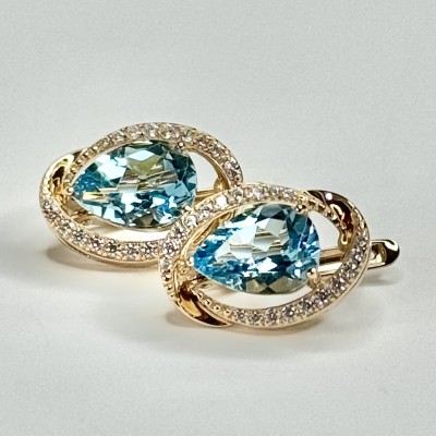 Серьги с топазом и  фианитом из красного золота 585 пробы фото