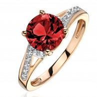 Кольцо с гранатом и  фианитом из красного золота 585 пробы фото