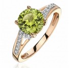 Кольцо с фианитом и хризолитом из красного золота 585 пробы