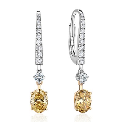 Серьги с бриллиантом из комбинированного золота 585 пробы фото